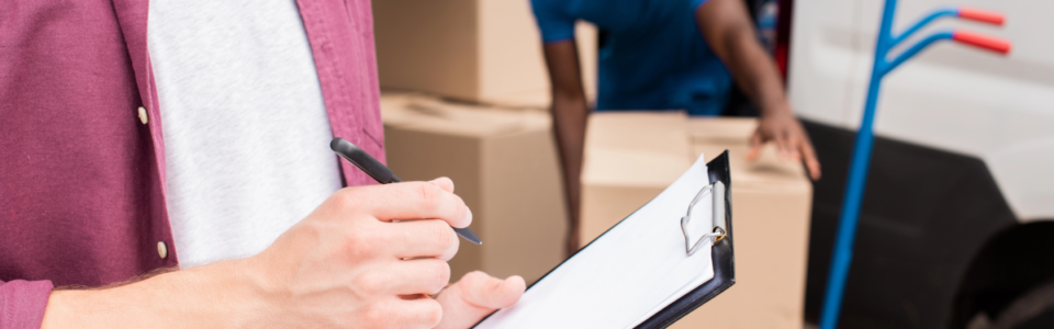 cropped image of customer holding clipboard and delivery man unloading boxes to highlight the importance of CLM Software for Transportation and Logistics